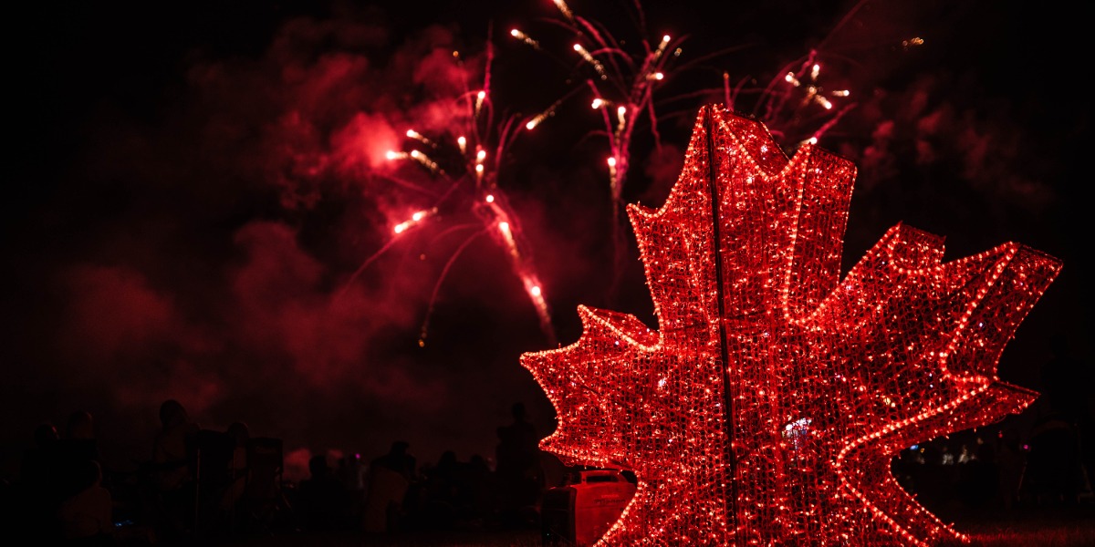 Maple Leaf in front of fireworks