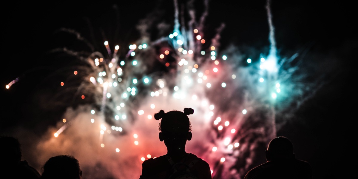 Young girl watching fireworks